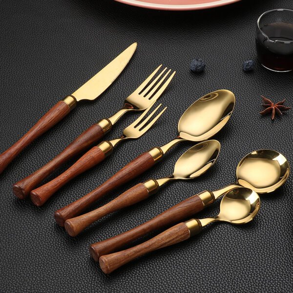 MZCJ-0004   304 stainless steel small waist design rosewood handle non-slip western dining set. Including 7 styles of knives, forks, spoons, etc. They can be freely combined. The color can be customized
