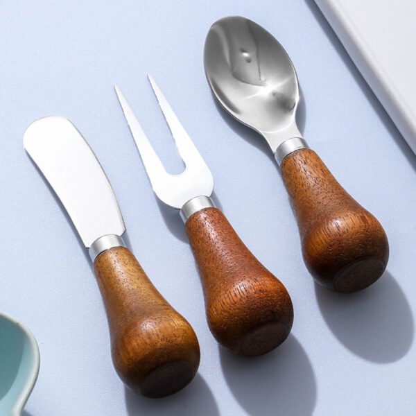MZCJ-0005   Children's creative tableware with anti-slip wooden handles. Children's spoon, fork and knife set. Can stand upright on a flat surface