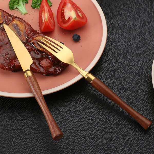 MZCJ-0004   304 stainless steel small waist design rosewood handle non-slip western dining set. Including 7 styles of knives, forks, spoons, etc. They can be freely combined. The color can be customized