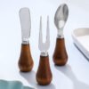 MZCJ-0005   Children's creative tableware with anti-slip wooden handles. Children's spoon, fork and knife set. Can stand upright on a flat surface