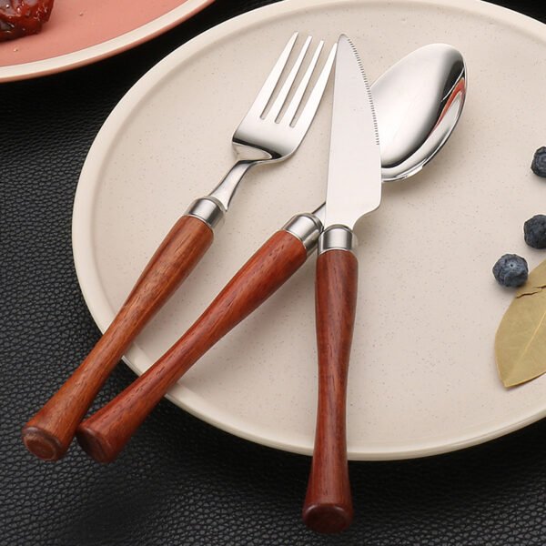 MZCJ-0004   304 stainless steel small waist design rosewood handle non-slip western dining set. Including 7 styles of knives, forks, spoons, etc. They can be freely combined. The color can be customized
