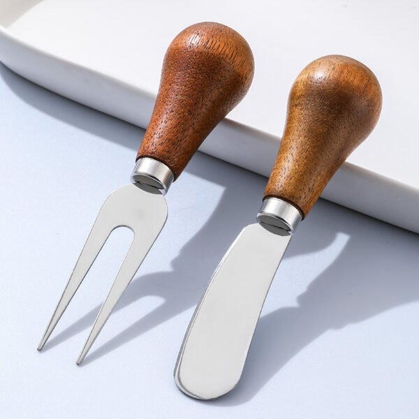 MZCJ-0005   Children's creative tableware with anti-slip wooden handles. Children's spoon, fork and knife set. Can stand upright on a flat surface